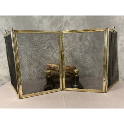 Antique polished brass fireplace screen from the 19th century