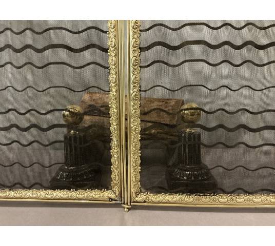 Antique pressed brass fireplace screen from the 19th century