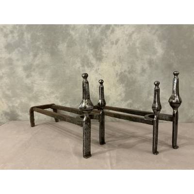 Pair of double wrought iron andirons from the 18th century