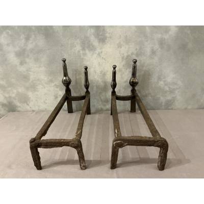 Pair of double wrought iron andirons from the 18th century