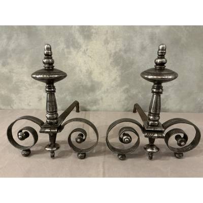 Beautiful pair of antique wrought iron andirons from the early 19th century