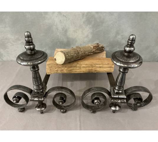 Beautiful pair of antique wrought iron andirons from the early 19th century