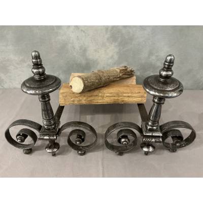 Beautiful pair of antique wrought iron andirons from the early 19th century