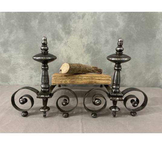 Beautiful pair of antique wrought iron andirons from the early 19th century