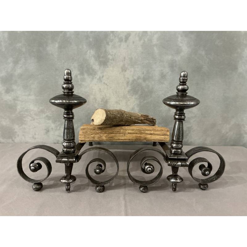 Beautiful pair of antique wrought iron andirons from the early 19th century