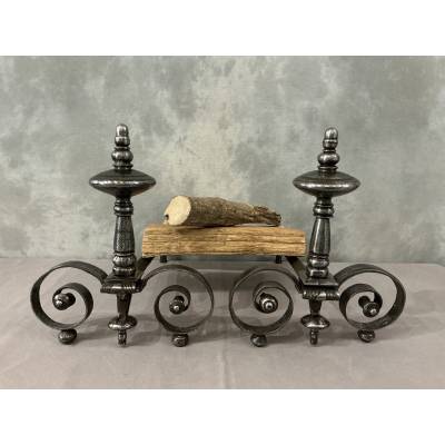 Beautiful pair of antique wrought iron andirons from the early 19th century