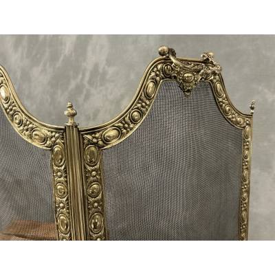 Antique brass fireplace screen from the 19th century