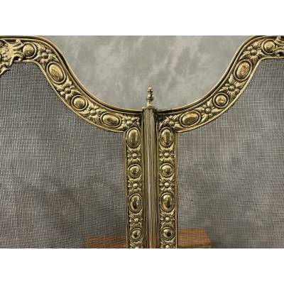 Antique brass fireplace screen from the 19th century