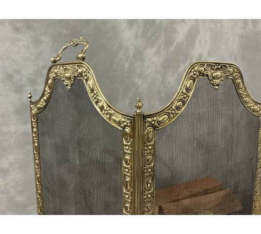Antique brass fireplace screen from the 19th century