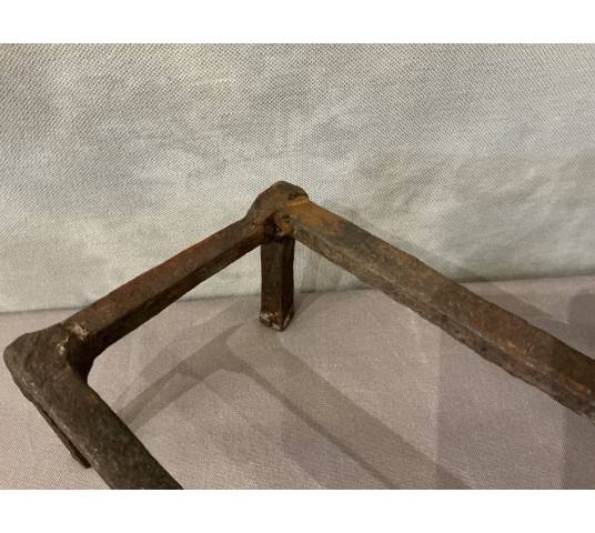 Pair of antique iron andirons from the 18th century
