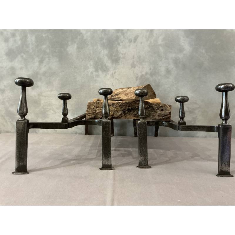 Pair of antique iron andirons from the 18th century