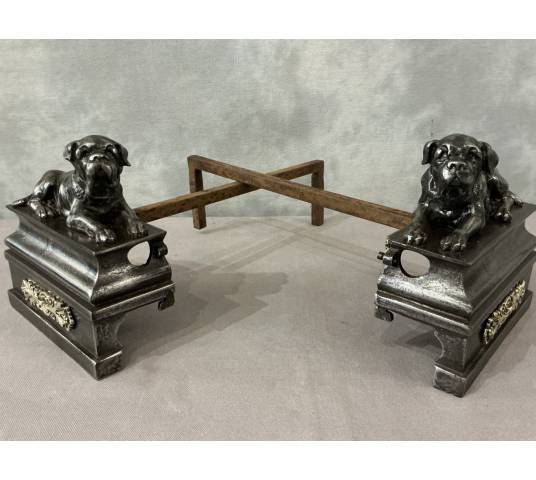 Pair of antique cast iron dog-decorated andirons from the 19th century