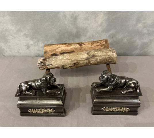 Pair of antique cast iron dog-decorated andirons from the 19th century
