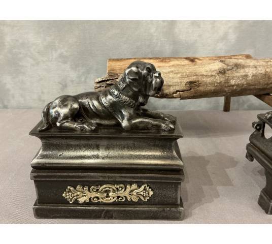 Pair of antique cast iron dog-decorated andirons from the 19th century