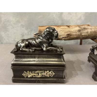 Pair of antique cast iron dog-decorated andirons from the 19th century