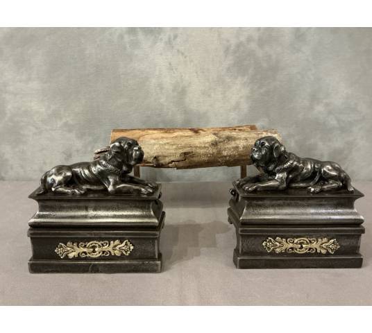 Pair of antique cast iron dog-decorated andirons from the 19th century
