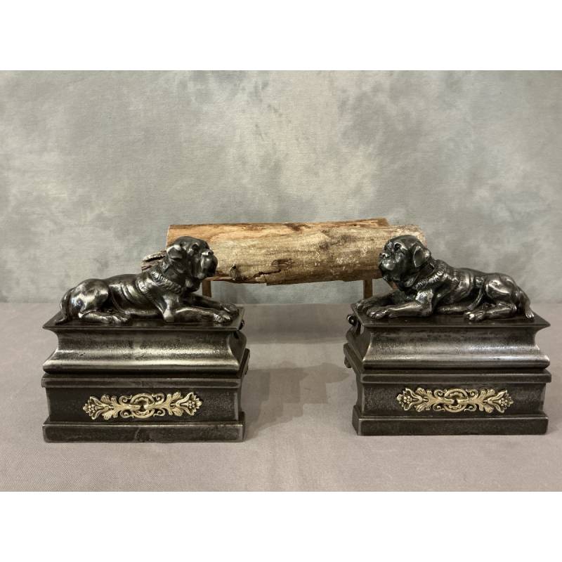 Pair of antique cast iron dog-decorated andirons from the 19th century