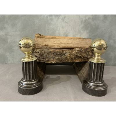 Pair of antique cast iron and brass andirons from the 19th century