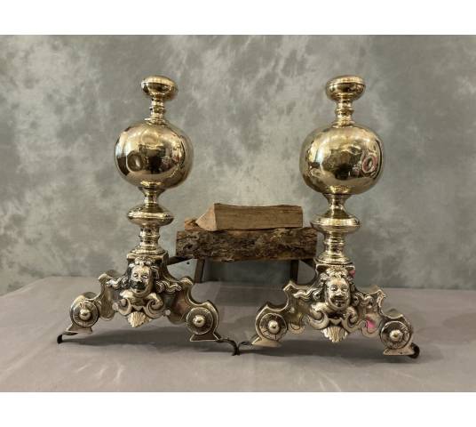 Pair of brass and bronze andirons with 17th-century gargoyles