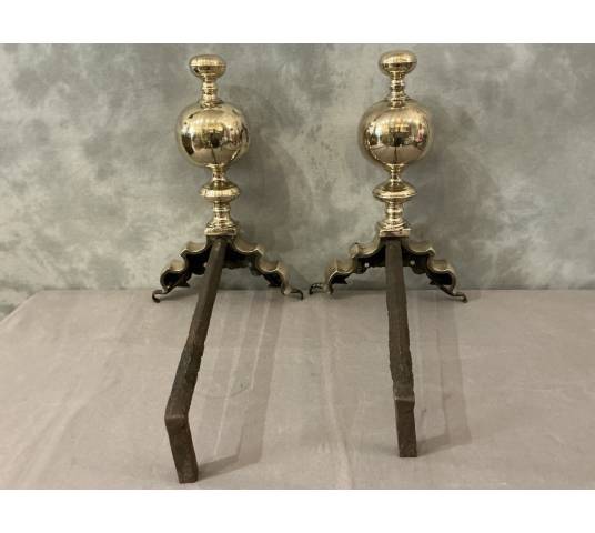 Pair of brass and bronze andirons with 17th-century gargoyles