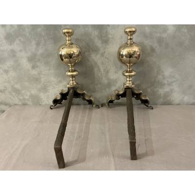 Pair of brass and bronze andirons with 17th-century gargoyles