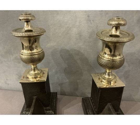 Pair of antique cast iron and brass andirons from the 19th century
