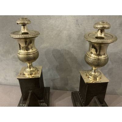 Pair of antique cast iron and brass andirons from the 19th century