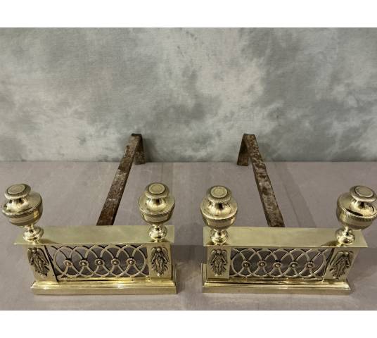 Beautiful small antique andirons from the Directoire period in bronze and brass