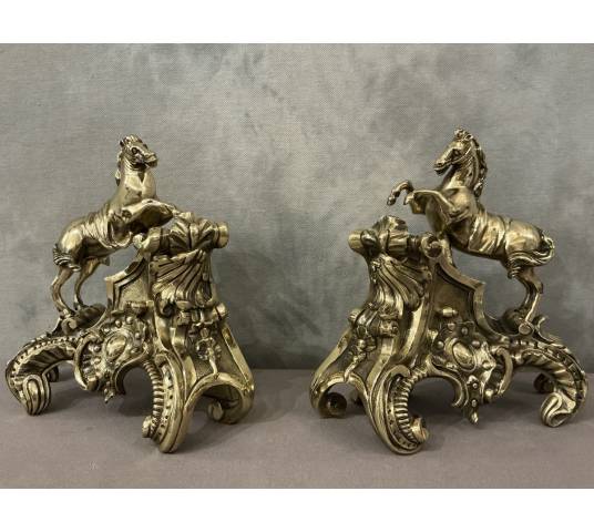 Exquisite antique bronze andirons depicting horses from the 19th century