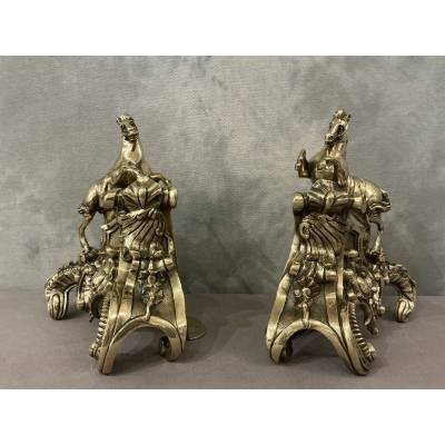 Exquisite antique bronze andirons depicting horses from the 19th century
