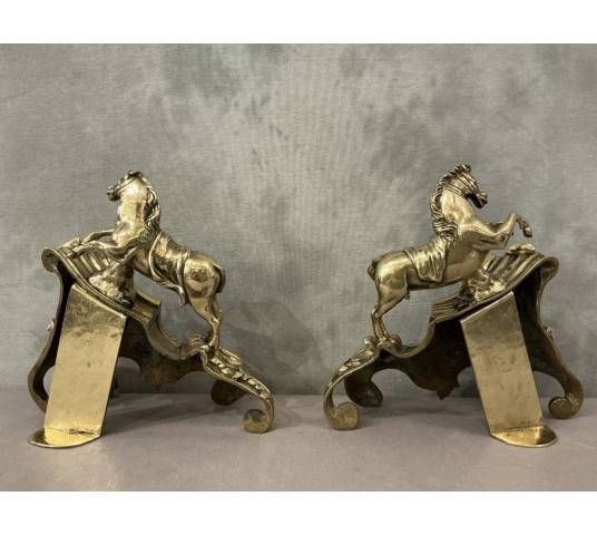 Exquisite antique bronze andirons depicting horses from the 19th century