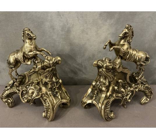 Exquisite antique bronze andirons depicting horses from the 19th century