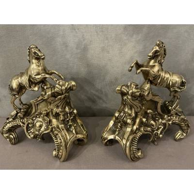 Exquisite antique bronze andirons depicting horses from the 19th century