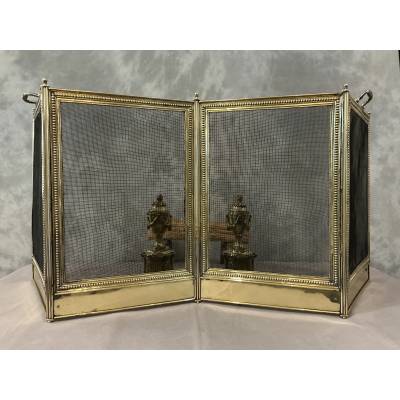 Pare feu de cheminée ancien en laiton de style Louis XVI