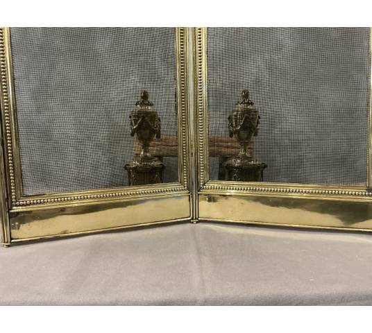 Pare feu de cheminée ancien en laiton de style Louis XVI