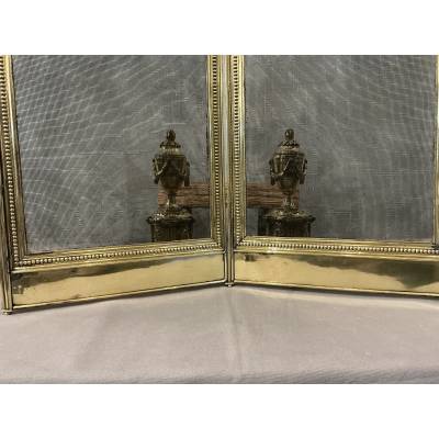 Pare feu de cheminée ancien en laiton de style Louis XVI