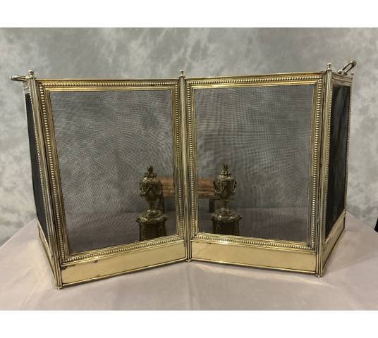 Pare feu de cheminée ancien en laiton de style Louis XVI