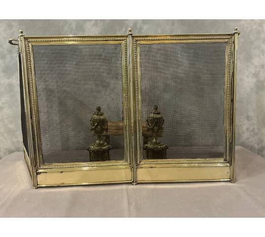 Pare feu de cheminée ancien en laiton de style Louis XVI