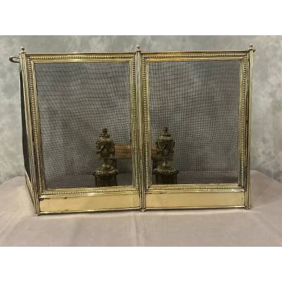 Pare feu de cheminée ancien en laiton de style Louis XVI