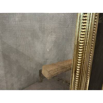 Pare feu de cheminée ancien en laiton de style Louis XVI