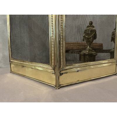 Pare feu de cheminée ancien en laiton de style Louis XVI