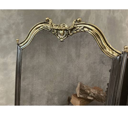 Pare feu de cheminée ancien en fer et laiton d'époque 19 ème