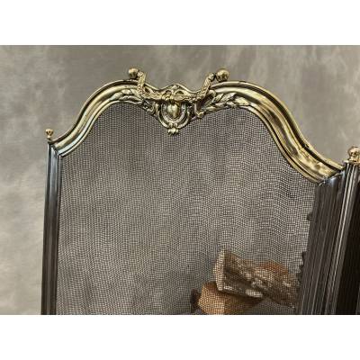 Pare feu de cheminée ancien en fer et laiton d'époque 19 ème