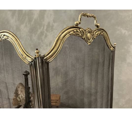 Pare feu de cheminée ancien en fer et laiton d'époque 19 ème