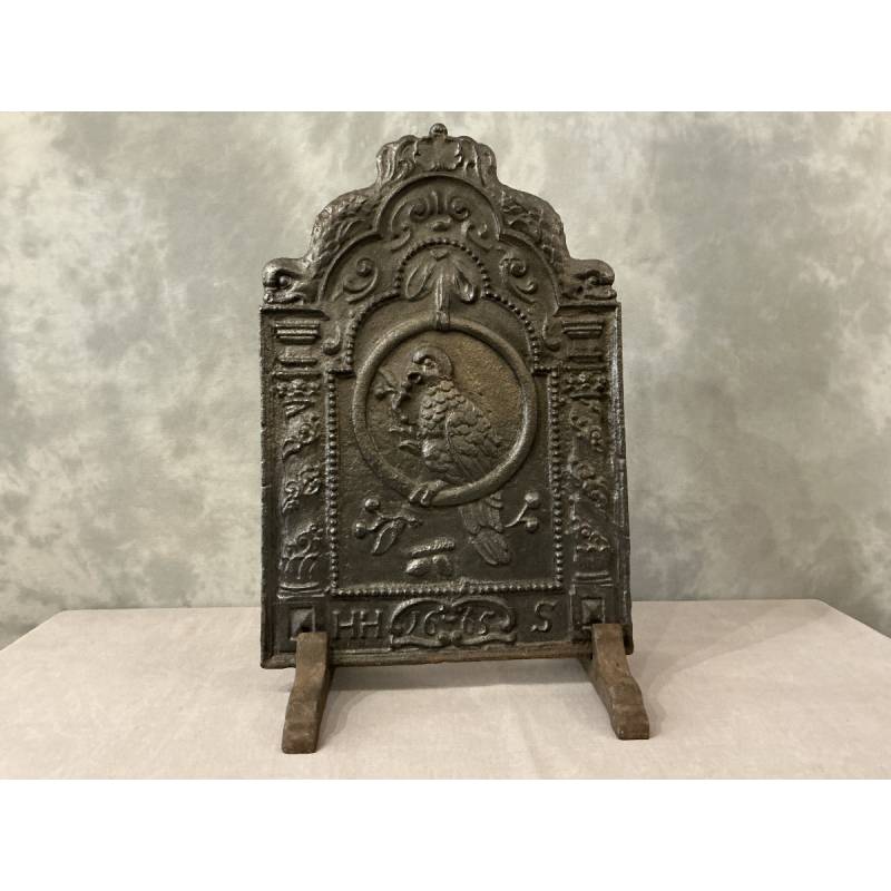 Antique cast iron fireplace backplate dating from the late 17th century