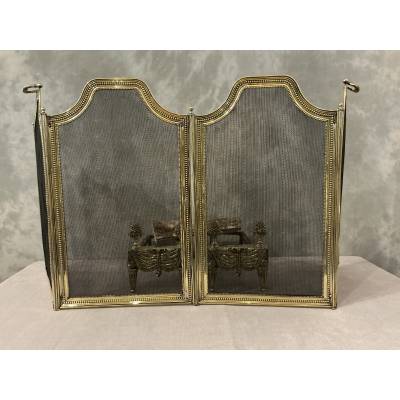 19th century brass fireplace screen in the Louis XVI style