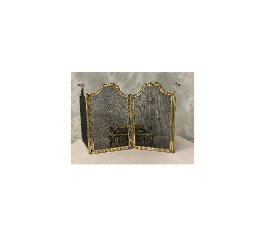 19th century brass fireplace screen in the Louis XVI style