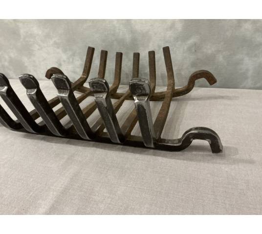 Late 19th century iron and cast iron fireplace grate