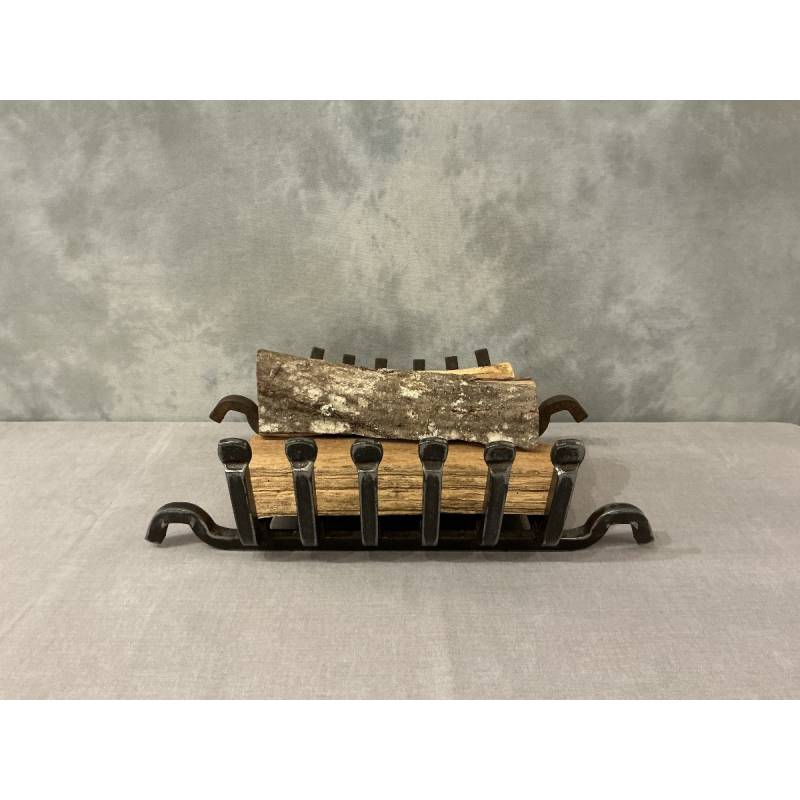 Late 19th century iron and cast iron fireplace grate