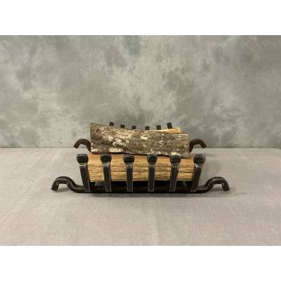 Late 19th century iron and cast iron fireplace grate